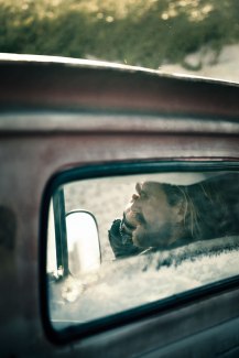 view through the back window of an old pickup