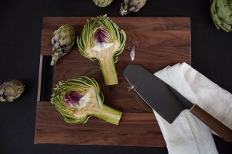 artichokes chopped on a board