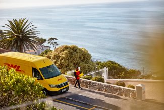 DHL driver steps out of his car