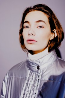 portrait of girl in silver snowjacket