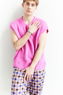 young man with pink nailpolish