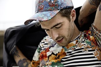 young man with flower t-shirt