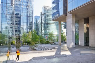 DHL Chile DHL courier delivers a shipment in CBD of Santiago de Chile
