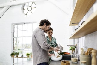 couple preparing food in the kitchen