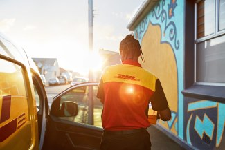 DHL employer stepping out of his car