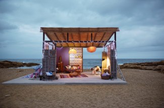 an open hut on the beach