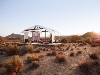  a open hut in a desert environment