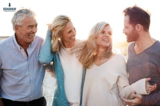 couple and her parents at the beach