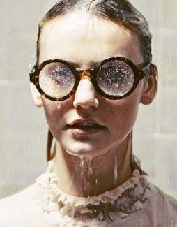 portrait of a girl, wearing glases with waterdrop
