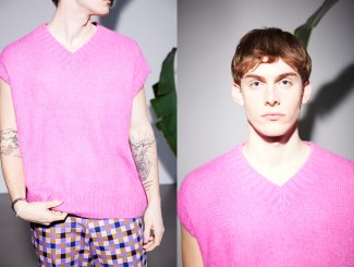 young man with pink pullover