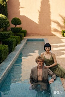 a young couple on a fashion shoot, inside and beside a pool